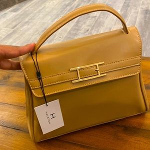 Halston purse, color light tan, new w/tags.